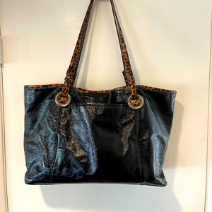 Brighton tote patent leather with animal print interior.